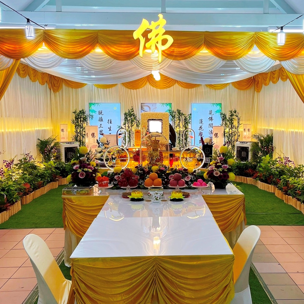 buddhist funeral yellow and white tentage at hdb void deck