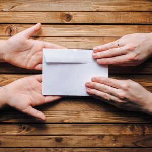 white envelope with condolence money